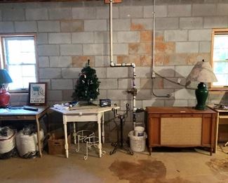 Nice small painted tables, metal pot holders, mini Christmas tree, stereo cabinet, lamps...