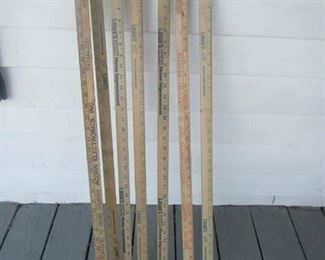 Yard sticks. A couple advertising ones in this lot