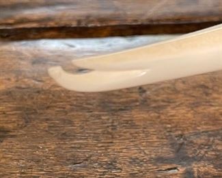 eskimo-Aleut hunter sculpture Ivory and Soapstone Michael Mandregan 4.5x9x3in HxWxD