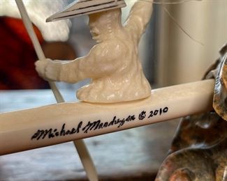 eskimo-Aleut hunter sculpture Ivory and Soapstone Michael Mandregan 4.5x9x3in HxWxD