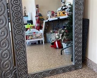 Silver metallic medium size mirror Total length & width 36in x 30in.