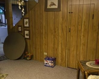 Table top, couch and ottoman, end table, wall hangings