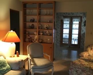 Chairs, ottoman, collectibles, couch
