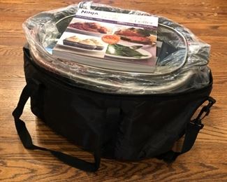 Brand New! Ninja 4 -In- 1 cook system in original packaging with cookbook!