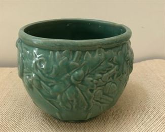Ceramic pot measures 7" tall with 7" diameter opening
