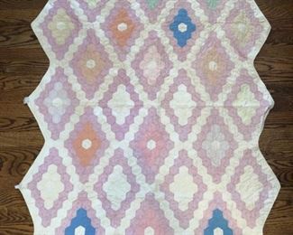 Antique crib quilt measures 55" x 38"