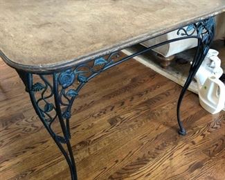 Antique Woodard Chantilly Rose outdoor wrought iron dining table with wood top. Measures 68" long with extension. It's 38" wide