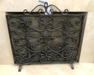 Metal scroll fireplace screen. "Screen" measures 37" wide and 27" tall