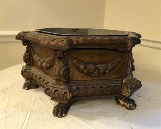 Antique wood planter with metal liner. Measures 21" wide with a 15 1/2" opening. Stands 10" tall. Beautiful bones...needs some TLC