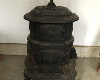 Antique cast iron parlor stove, circa 1880s - 1890s. Manufactured W.M. Resor & Company (Cincinnati, OH). Measures 38" H x 20" D x 24" W. Picture 1 of 2