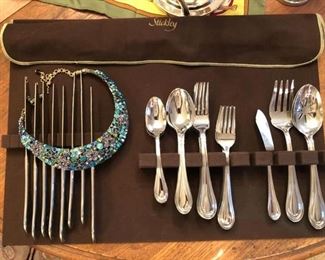 Towle Stainless steel 5-piece flatware service for 8 and 3 serving pieces. Heidi Daus Swarovski crystal necklace