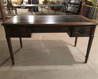 Sligh Lowry leather top writing desk measures 55.5" W x 31" H x 27" D. Picture 1 of 2