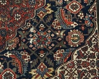 Antique Persian rug measures 4' 2" x 6' 8." Photo 2 of 2