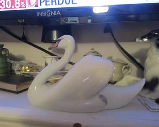 Royal   Copenhagen Swan. The collection has LOTS of expensive little goodies.