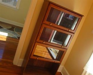 Legal Bookcase-- there are other legal bookcases and open bookcases. THIS COLLECTOR HAD LOTS OF BOOKS AND HE  HAD TO PUT THEM INTO CASES. IF YOU NEED CASES, WE HAVE THEM!