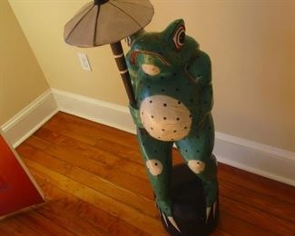 Carved and painted frog figure