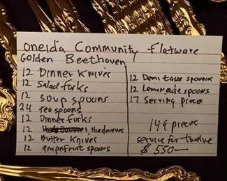 the listing for the gold large silverware set  Oneida Golden Beethoven set, amazing  149 pieces 