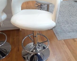 Chrome bar stool covered with white leather (six available)
