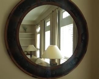 Round mirror in metal frame