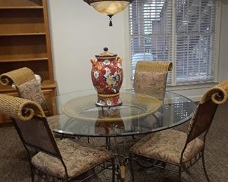 Beautiful glass top table and four chairs