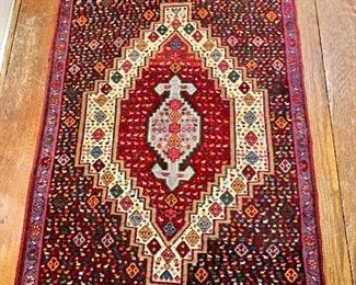 $125 - Hand woven rug - 40" x 29"