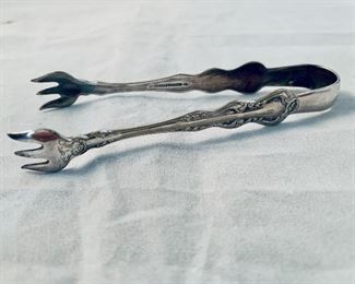 $25 - Holmes & Edward sterling silver fork tongs; 4.25" long
