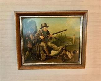 $20 - Framed print of a hunter on panel; 9" W x 7.5" H