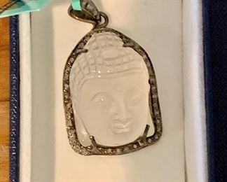 $140; Crystal silver and diamond Buddha head pendant