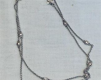 $80;Judith Ripka sterling silver station necklace with pink cz;  approx 36" long; stamped 925 CZ