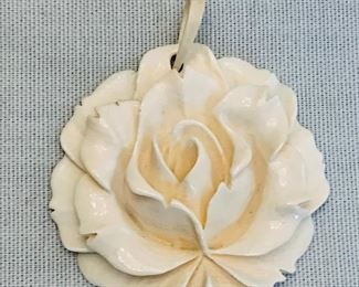 $10; Carved flower pendant; approx 2" diameter 