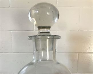 Price: $40. Mid century bulbous decanter with solid stopper. Excellent. Measures: 10"H x 4.5"Base