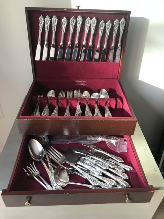 Price: $2,500. 106 pieces - Wallace Sterling Rose Point pattern in own silver case. Includes 96 flatware pieces / 10 serving pieces. Flatware weighs 6 lbs. excluding knives, spreaders and carving set.
