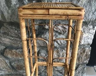 Price: $85. Bamboo stand with some loss as seat corners. Measures: 30"H x 12"sq top