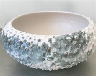 Price: $125. Wonderful sea urchin bowl in creamy white and teal with gold accents, by Andersen Design of Maine. In excellent condition.  Measures: 9.5"W x 3" base x 4.5"H