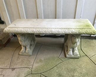 Price: $125. Garden bench with lion stands - sheltered under breezeway.  