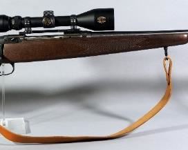 Savage Model 110 7mm REM MAG Bolt Action Rifle SN# G003217, With Simmons Aetec 2.8-10x44 Scope And Leather Sling