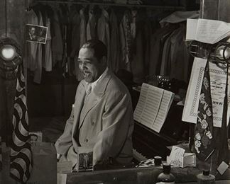 1099
William Paul Gottlieb
1917-2006, American
Edward Kennedy "Duke" Ellington (1899-1974), 1947
Black and white photograph on paper under glass
Signed lower left: William P. Gottlieb, and with the copyright symbol
Sight: 13.5" H x 10.5" W
Estimate: $500 - $700