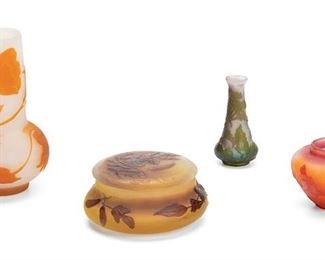 2007
Four Gallé Cameo Glassware Items
Late 19th/early 20th Century; Nancy, France
Two signed: Galle; Two signed: Galle [starred]
Comprising one wide-shouldered "hawthorn" bud vase with cut red to pale orange frost, one tapered "violet" bud vase with cut green to purple frost, one gourd-style "poppy" vase with cut orange to white frost, and one "sweet pea" powder jar with cut amethyst to pale yellow frost, 4 pieces
Largest: 6" H x 3.5" Dia.; Smallest: 2.25" H x 3" Dia.
Estimate: $800 - $1,200