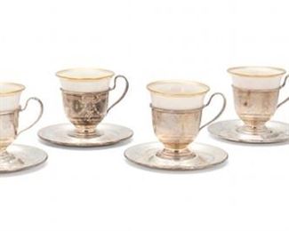 2011
A Set Of Sterling Silver Demitasse Cups
First-quarter 20th Century
Sterling marked for R. Wallace & Sons Mfg. Co.; Porcelain marked for Lenox
Comprising six sterling silver footed demitasse cups with handles and gilt rim porcelain liners and six saucers, all with chased floral and swag motifs, 18 pieces
Cups: 2.75" H 3.125" W x 2.5" D; Saucers: 4" Dia.
15.19 oz. troy approximately
Estimate: $200 - $300