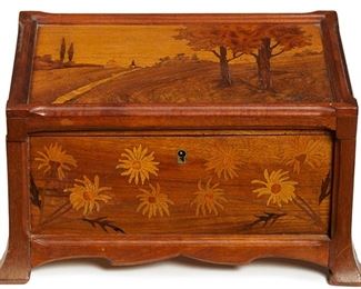 2017
A Gallé Style Marquetry Inlay Table Top Jewelry Box
Circa 1900
Signed in inlaid wood to lid: Galle
The Art Nouveau jewelry box with hinged lid, inside mirror, and lift-out shallow drawer
7.75" H x 13.5" W x 9.5" D
Estimate: $800 - $1,200
