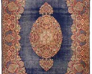 2018
A Kirman Area Rug
Circa 1930s
Wool on cotton foundation, with all-over floral patterning and central medallion on cobalt field
163" L x 116" W
Estimate: $800 - $1,200