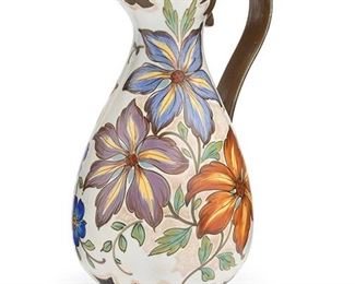 2021
A Large Gouda, Zuid Holland Porcelain Floral Pitcher
20th Century
Marked: [PZH house] / 4321 / UNICA / Koninklijik Gouda / Royal / Made in Holland
In the "Unica" pattern, the body painted with floral blossoms
13.75" H x 8.5" W x 7" D
Estimate: $200 - $300