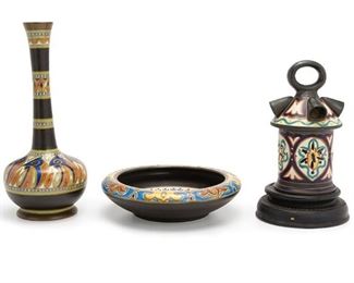 2022
Three Gouda Pottery Pieces
20th Century
Each signed for Gouda
Comprising a tall-necked vase, a low bowl, and a lamp, 3 pieces
Largest: 14" H x 5.5" Dia.
Estimate: $200 - $400