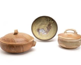 2032
A Three-Piece Group Of Studio Pottery
Fourth-quarter 20th Century
One with indistinct signature to base
Comprising a large green and brown glazed low bowl with two natural glazed covered vessels, one with handles and sky blue interior spout, 3 pieces
Largest: 7" H x 13" W x 11" D
Estimate: $200 - $300