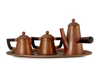 2035
A Hector Aguilar Wood And Copper Espresso Set
Circa 1940s; Taxco, Mexico
Each marked for Hector Aguilar; Further marked: Taxco / Mexico
Comprising an espresso pot (6" H x 6.325" W x 4.5" D), a covered sugar bowl (3.75" H x 5.325" W x 3.25" D), a cream jug (3.875" H x 4.25" W x 3.25" D), and a tray (.5" H x 14" W x 7.875" D), 4 pieces
Estimate: $200 - $400