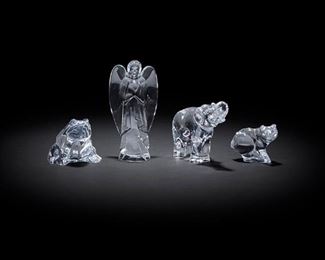 2090
Four Clear Art Glass Figures
Fourth-quarter 20th Century
Each marked for maker
Comprising a Baccarat angel, a Baccarat frog, a Baccarat elephant, and a Daum pig, 4 pieces
Largest: 6" H x 3" W x 1.625" D
Estimate: $300 - $500