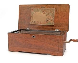 2099
A Small Table Top Swiss Music Box
Circa 1888
Labeled: M/F with maker's mark
With one aire
6.5" H x 17.25" W x 9" D
Estimate: $400 - $600