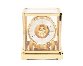 2103
A Brass Le Coultre "Atmos" Clock, Model 519
Circa late 1940s/early 1950s
Marked: Atmos / Le Coultre / Switzerland / Fifteen Jewels; Further marked with serial number: 33493
With round dial, Arabic hour markers, a floating intermediate wheel unique to this caliber, and heavier and thicker plates and movement than newer models housed in a glass and brass case
9.25" H x 8.25" W x 6.5" D
Estimate: $400 - $600