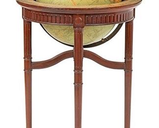 2105
A Replogle Standing Library Globe
Mid-20th Century
With zodiac horizon band resting upon a fluted apron atop tapered legs
39" H x 23" Dia.
Estimate: $600 - $900