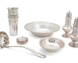 2114
A Group Of American Sterling Silver Table Objects
Late 19th/mid-20th Century
Each marked for sterling
In a variety of patterns and variously monogrammed and inscribed, comprising one serving bowl with openwork banding, two bowls, nine nut/candy dishes, one Whiting Manufacturing Co. ladle in the "Louis XV" pattern, three yacht race trophy tumblers, and two Gorham shakers; Makers include: Gorham, Whiting Manufacturing Co., Alvin, and George A. Henckel & Co., 17 pieces
Largest: 12" H x 4.125" W x 3.75" D
51.08 oz. troy approximately
Estimate: $500 - $700